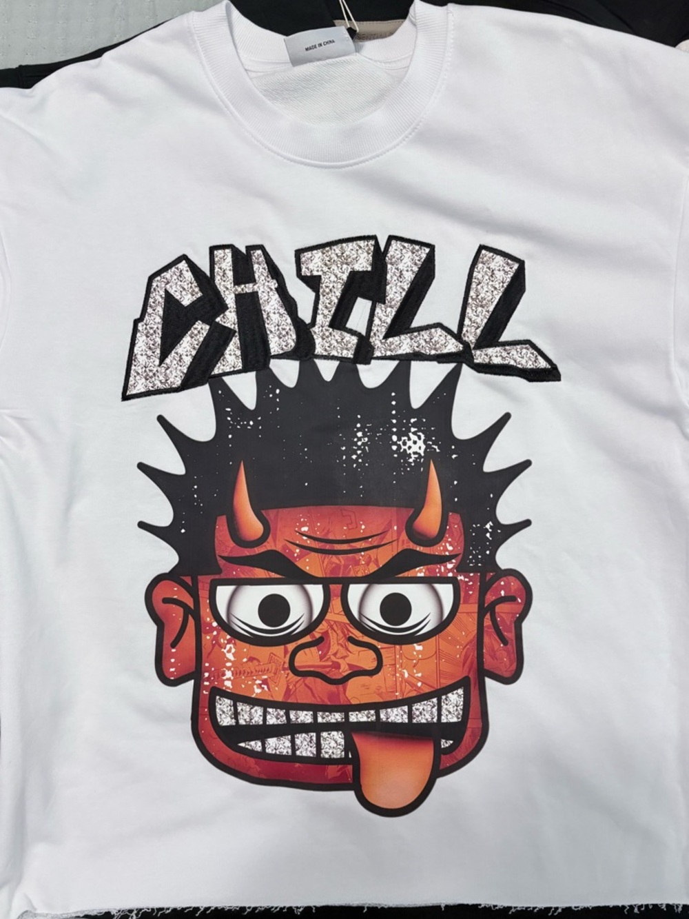 Jane and Bleecker White Graphic Tee with Red and Black Devil Face